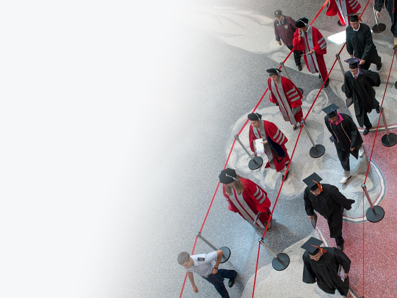 Students walking at Ohio State commencement